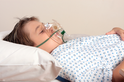 Unwell child oxygen mask